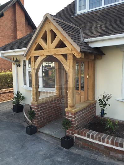 New front doorway with gabled canopy porch photo 2