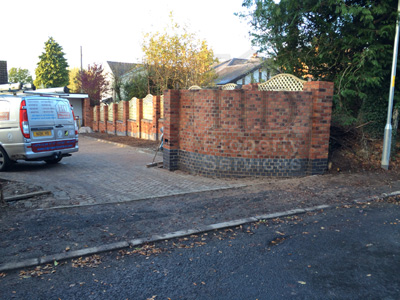 Gated Access with decorative walled fencing photo 11