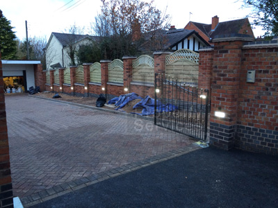 Gated Access with decorative walled fencing photo 13