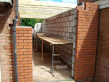 Brickwork at rear with space for the new French doors