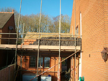 Removing & preserving the roof tiles (rear elevation)