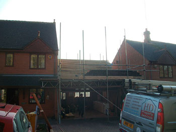 Removing & preserving the roof tiles (front elevation)