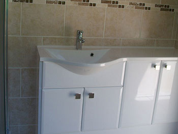 The completed en-suite shower room with concealed plumbing/waste
