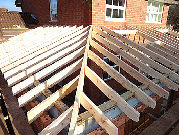 Our joinery team gets to work building the roof with a vaulted ceiling 4