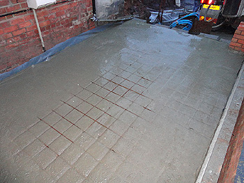 Steel reinforcement is added to the concrete base